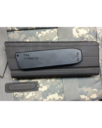 FAL 10/30 Limiter. Reduces a 30 round magazine down to 10 rounds. 