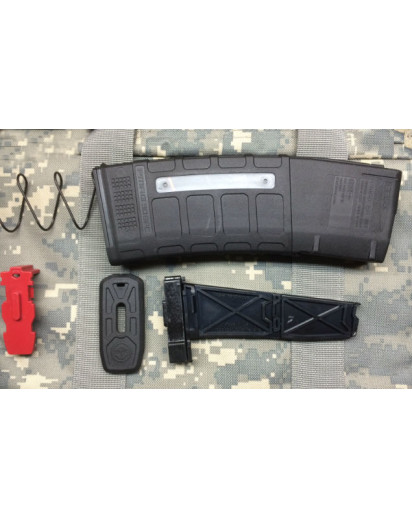 The Magblock 10 round limiter for the Pmag 6.8 mm 30 round magazines includes a limiter and lower spacer that replaces the red locking plate. Easy to install to make a 10 round magazine. 