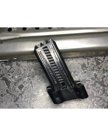 Ruger American 10_17 block with a hole in the middle near the base.