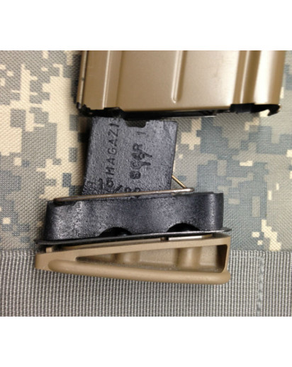 SCAR 17 Limiter being installed. Simple drop in limiter brings your 20 round magazines down to 15 rounds. 