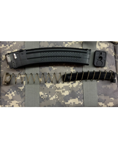 Sig MPX 10 Round Limiter replaces the original locking plate. An insert into the follower provides a level surface to engage the lower limiter. This insert must be epoxied into the follower. Shown here already secured in place. See other photos for more d