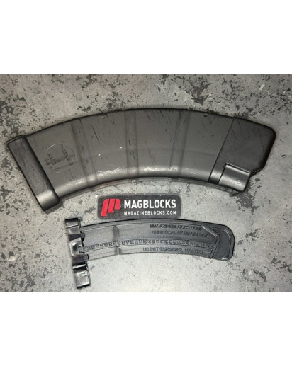 Thurmold_AK-47_10_30(7.62x39) This block installs at the base of the magazine and you will use the factory locking plate with the block