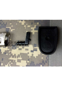 Installation of the S&W M&P-22 10 round limiter is simple. Just replace the 12 round locking plate with this custom 10 round locking plate.