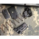 Works in original factory magazines with this type of follower. The locking plate (pictured on the left) will sit under the block, and lock into the floor plate as normal. (Old version pictured)