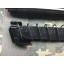 The arrow on the limiter points towards the front of the magazine.