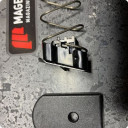 The original locking plate is removed from the spring and will sit under the limiter. 