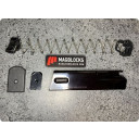 Beretta 96 Limiter installs at the base of the magazine as shown here. 