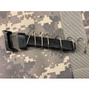 Simple installation under the follower and inside the spring as shown. 