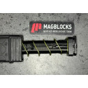 Grand Power Stribog Curved_10_30(9mm) the block inserts at the base of the magazine