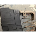 This photo shows a compatible magazine and follower. No modification to the magazine is required.  