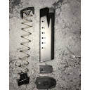 M&P 10/15 .40 Limiter shown installed in the spring correctly. 