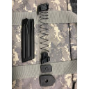 HK USP Limiter works in factory 15 round 9 mm magazines. Installs on top of the lower locking plate as shown. 